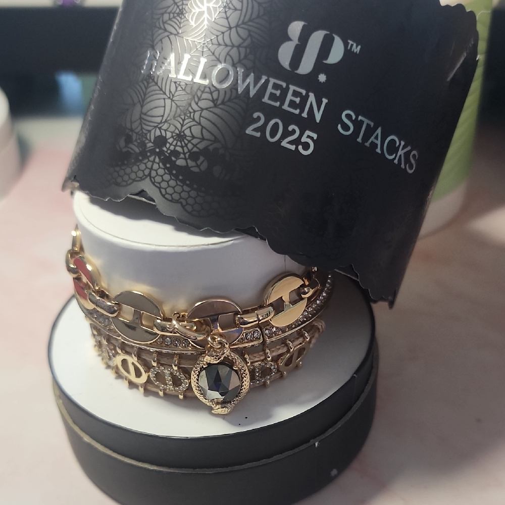 Gold-Tone Layered Charm Bracelet with Black Crystal Accent